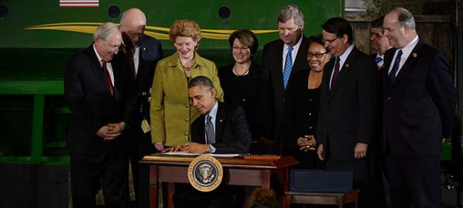 Obama signs 2014 Farm Bill