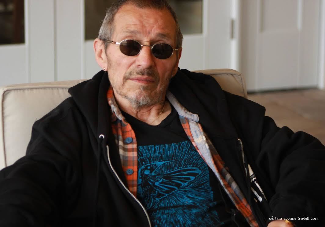 John Trudell, wearing sunglasses, smiles at the camera. Hemp activist John Trudell co-founded Hempstead Project Heart with musician Willie Nelson, before passing leadership of the organization to Marc Grignon in his final days.