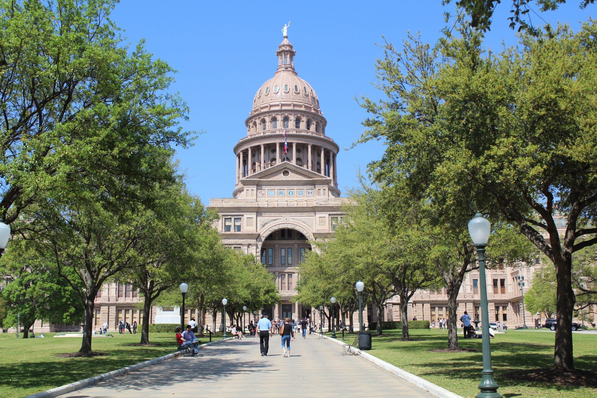 While the 2018 Farm Bill legalized industrial hemp, Texas still needs to reform its own "outdated" statutes, according to attorney Dan Sullivan. Photo: People walk along the tree-lined pathway to the Texas Capitol building, home of the Texas legislature.