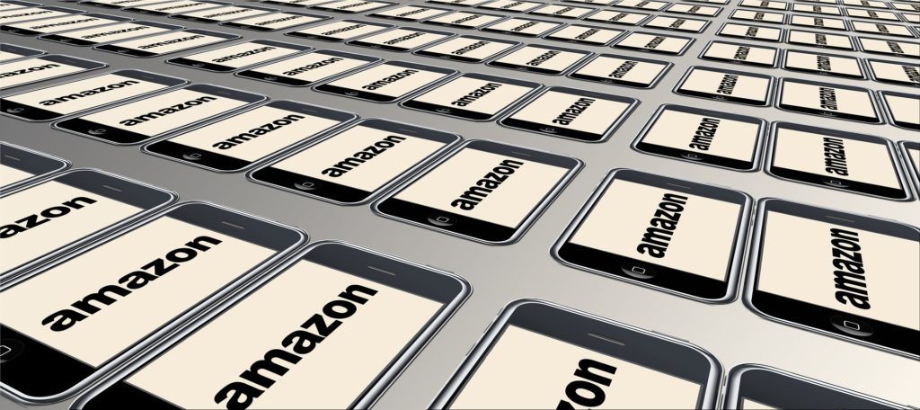 Photo: Image shows a rendering of an infinite number of tablet computers displaying the Amazon logo.