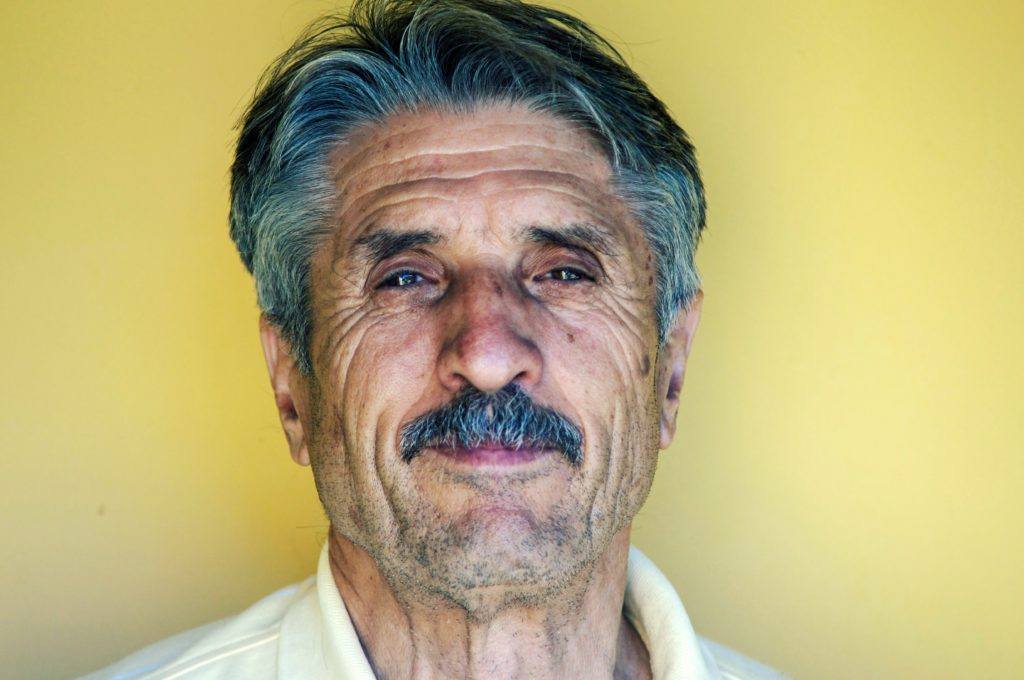 People of all ages are using CBD. As we got older, we may experience more symptoms that CBD can help with.Photo: An older man with a face with deepening wrinkles and graying hair and moustache smiles, photographed against a yellow wall.