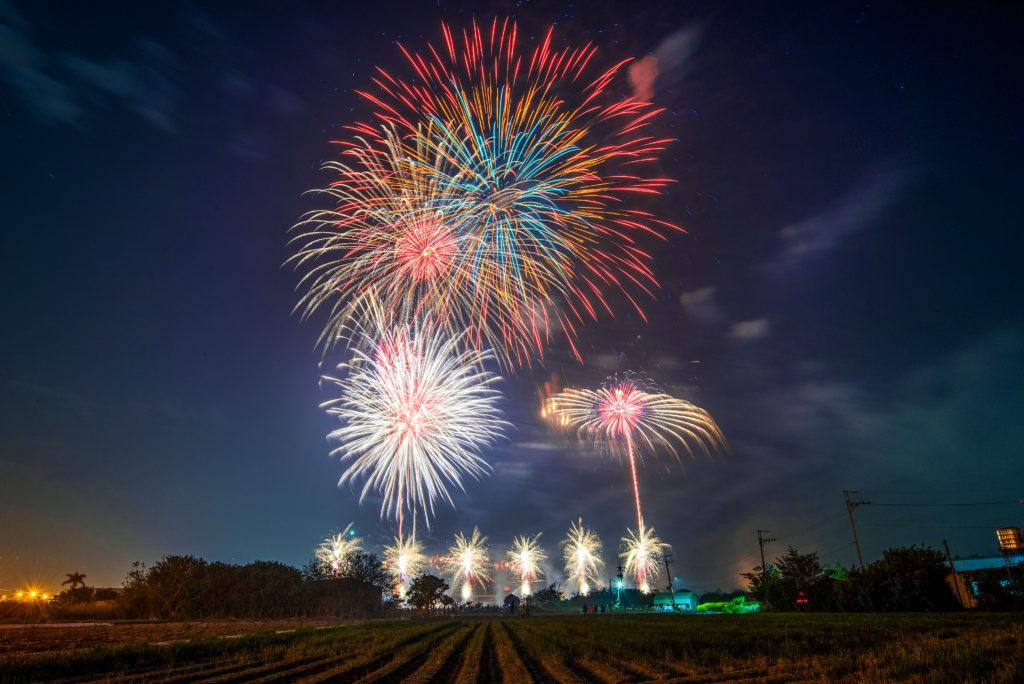 Despite the hemp boom, the reality for many hemp farmers is more difficult. Photo: Fireworks explode over a farm at night.