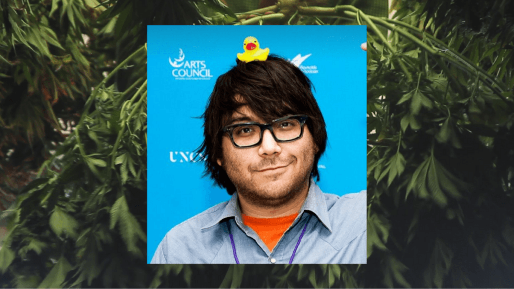 Photo: A composite image of hemp documentary creator Josh Harney, a smiling man with brown hair, a light beard and big dark glasses, with a rubber duck on his head. In the background, a photo of a freshly harvested hemp plant..