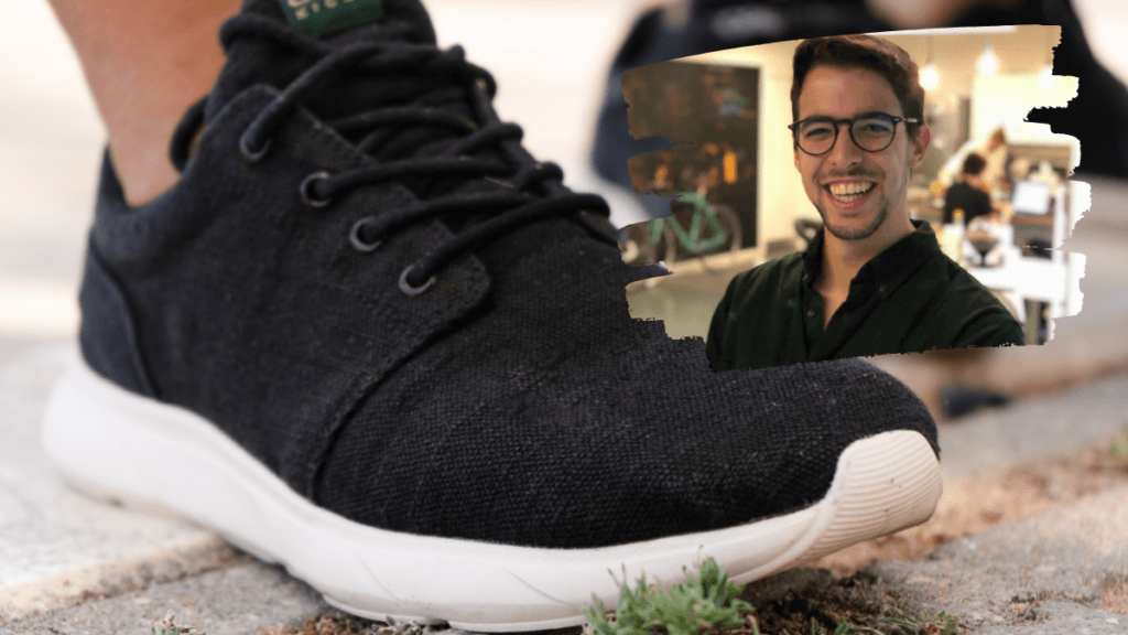 A pair of sneaker-style hemp shoes, with the body of the shoe dyed black and the base in white bioplastic rubber. in an insert photo is a headshot of the 8000 Kicks founder Bernardo Carreira.