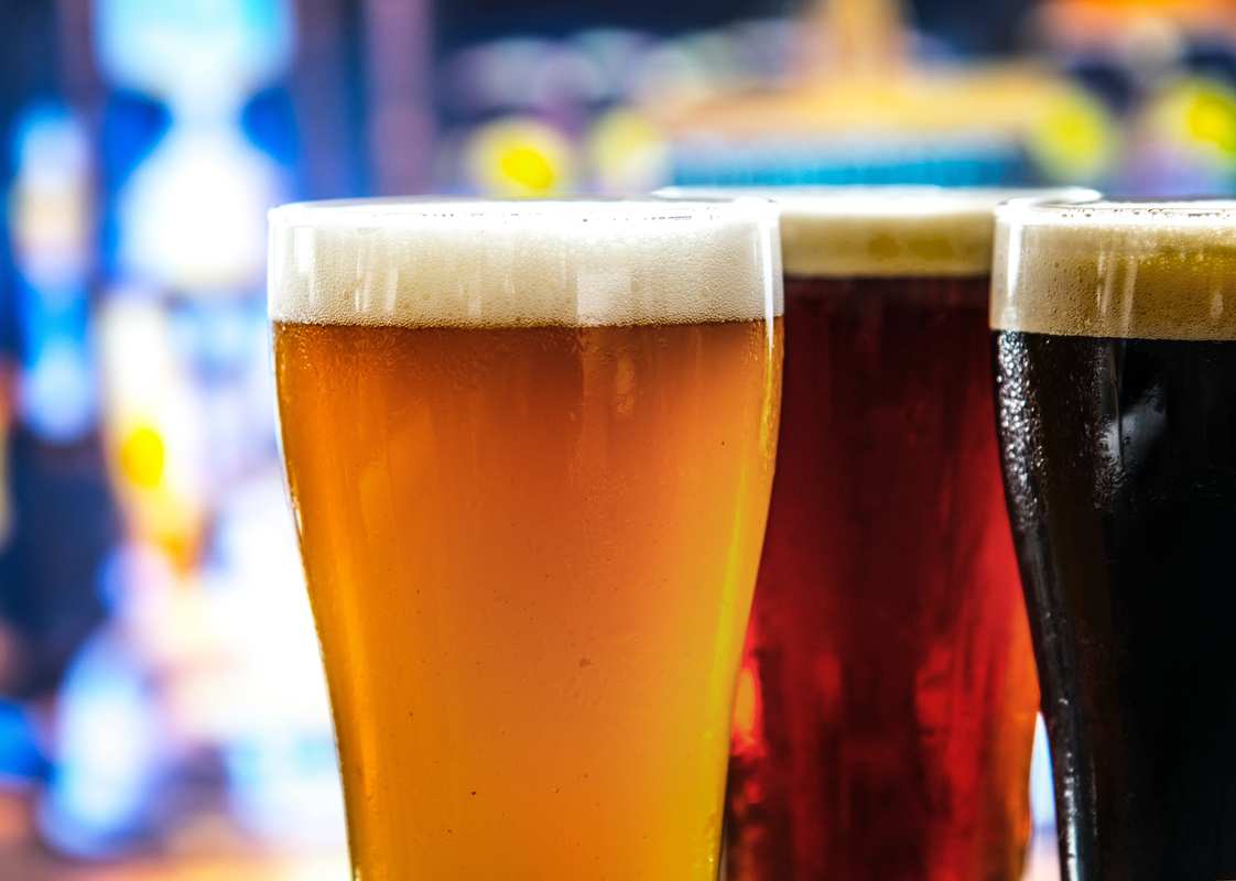 A photo showing three different beers of different colors in pint glasses. It's not just New Belgium: craft hemp beer is increasing in popularity.