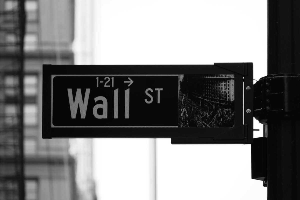 The Wall Street road sign in New York City, New York. In this article, we lay out some basics of investing in hemp stocks. Be careful: We're not investment experts, and can only get you started doing your own research!