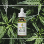 Photo: A bottle of CBD Pure Hemp Oil superimposed on a background of hemp leaves, with a white box drawn around the bottle.